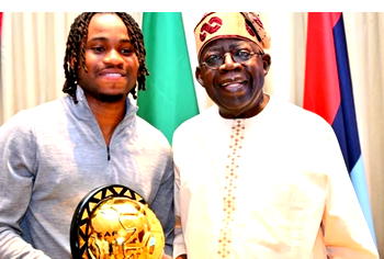 Photos: Ademola Lookman presents CAF player of the Year Award to Tinubu