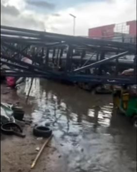 Scores injured as billboard kills tricycle rider in Aba