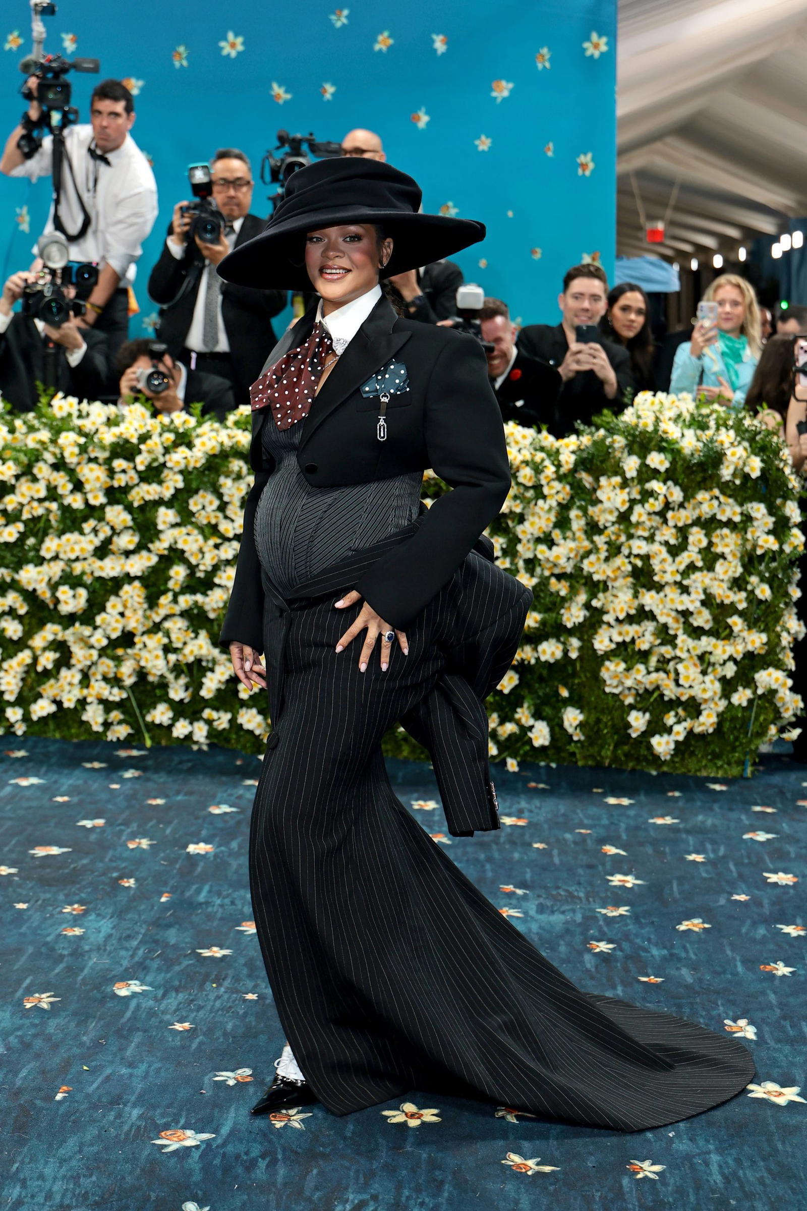 [PHOTOS] Rihanna stuns at 2025 Met Gala, announces third pregnancy in ...