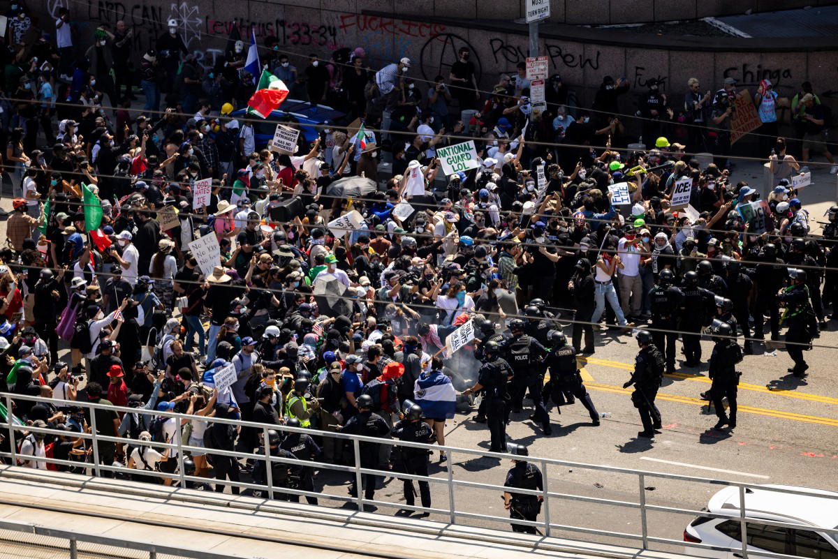 Unrest in Los Angeles over immigration raids as troops sent by Trump fan out