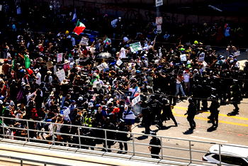 Unrest in Los Angeles over immigration raids as troops sent by Trump fan out