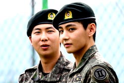 Two members of K-pop group BTS released from South Korea military