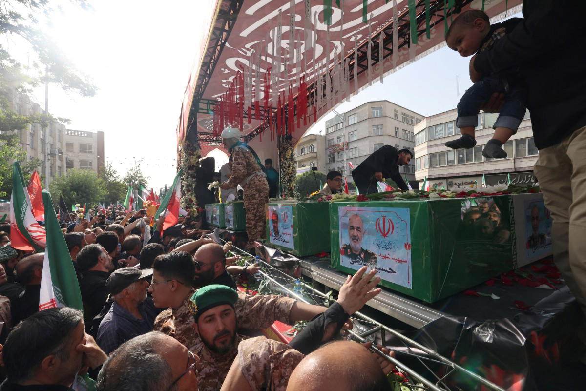 Iran holds state funeral for top brass killed in war with Israel