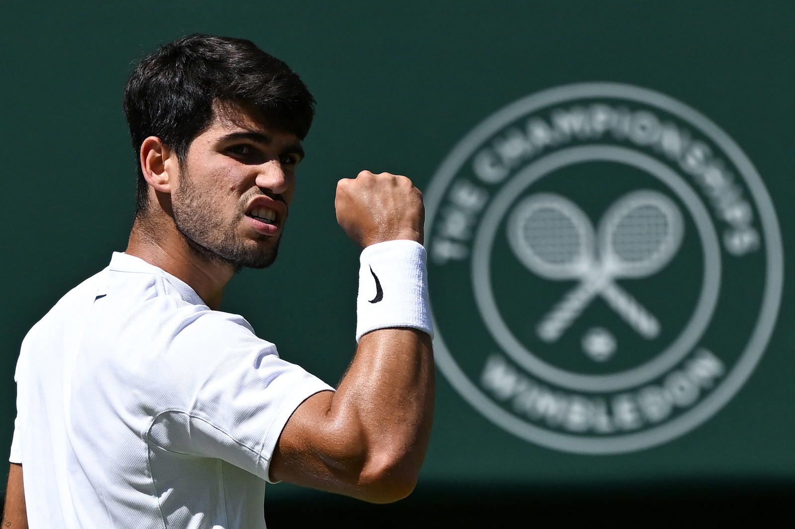 Alcaraz subdues Fritz to reach third successive Wimbledon final