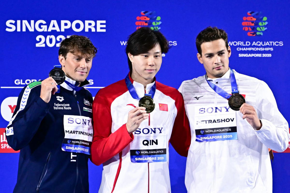 Qin eyes Olympic glory after winning 100m breaststroke world gold