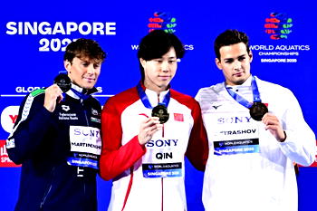 Qin eyes Olympic glory after winning 100m breaststroke world gold