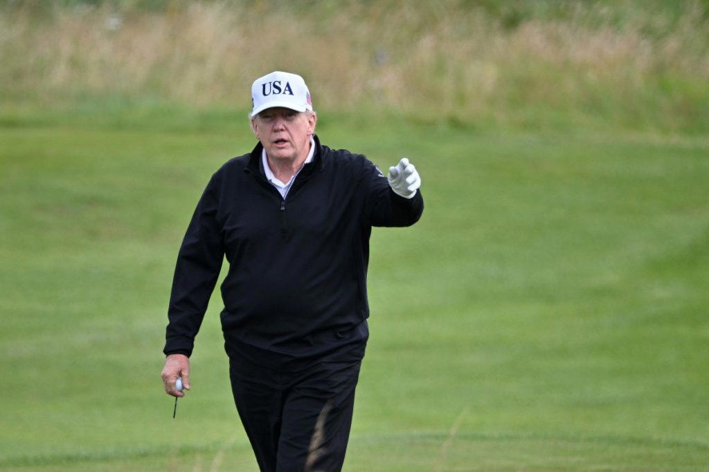 Trump hits Scottish golf course as protesters rally