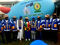 Photos: Residents play football as LASIEC chair, security agents monitor election