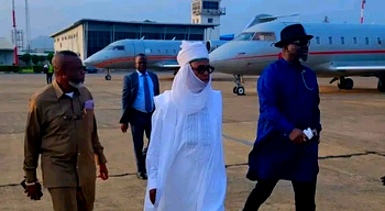 Dan Amanar of Daura, Amaechi, wears turban to Buhari’s burial
