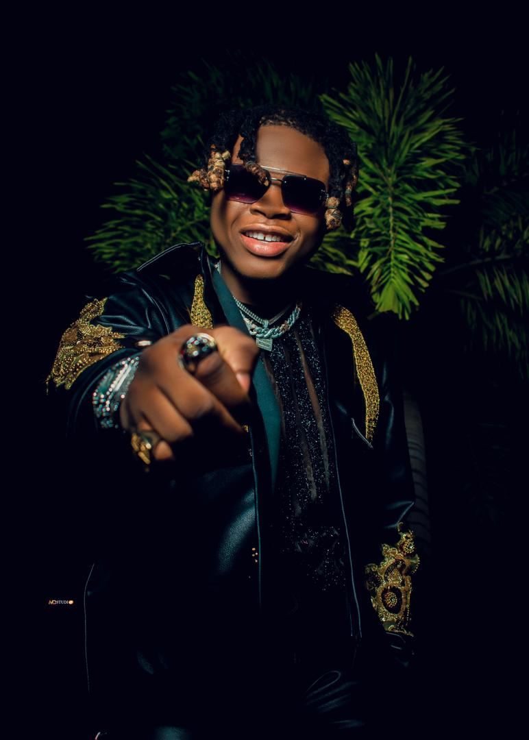 Biography of Oga Amos, age and Net worth