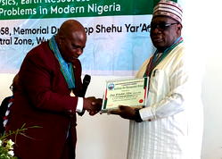 Nkom receives award for contributions to Geoscience