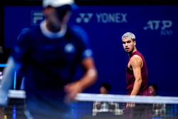 Alcaraz survives injury scare and rain delay to win Tokyo opener