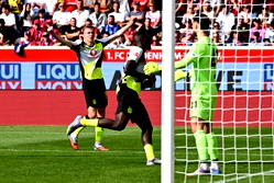 Guirassy scores again as Dortmund beat 10-man Heidenheim