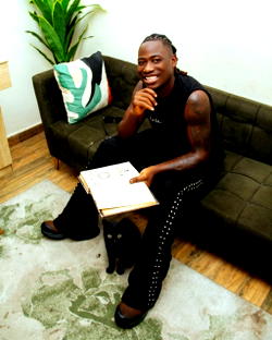 “Black cat is who I am” — Nigerian artist declares