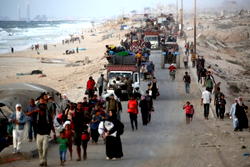 ‘We live with the dead’: Displaced Gazans shelter in cemetery