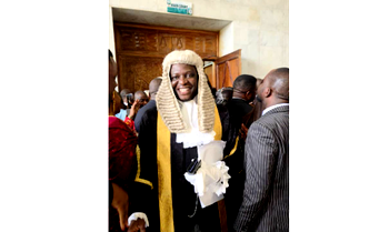 CJN swears in 57 new SANs, calls for integrity, reform in justice system