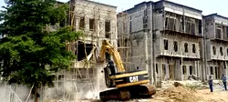 FCTA demolishes 11 buildings under high tension in Apo-Dutse