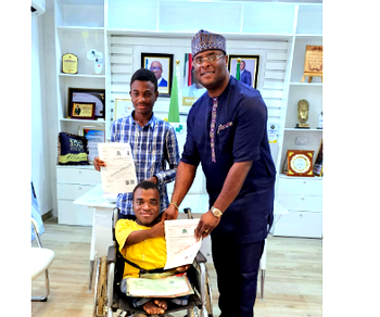 Edo Commissioner for Education, Iyamu, gives scholarship to two students with disabilities