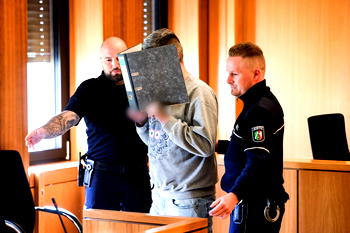 German nurse gets life sentence for killing 10 patients to reduce his workload