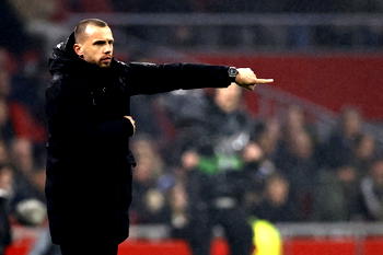 Ajax sack coach John Heitinga