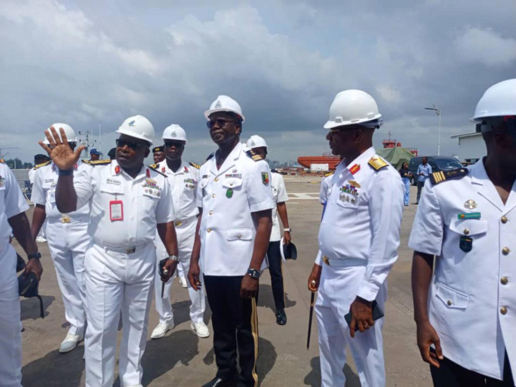 From l- Rear Admiral Ibrahim Shehu, Admiral Superintendent of the Naval Dockyard Limited, ; Captain Mohamed Idrissou, Director of Military Organisation and Personnel, Republic of Benin Navy and Commodore Igbani Agwu, NDL, during a walk round the NDL, as part of activities marking the hand over of the refitted Republic of Benin Navy Ship, at the NDL, Victoria Island, Lagos
