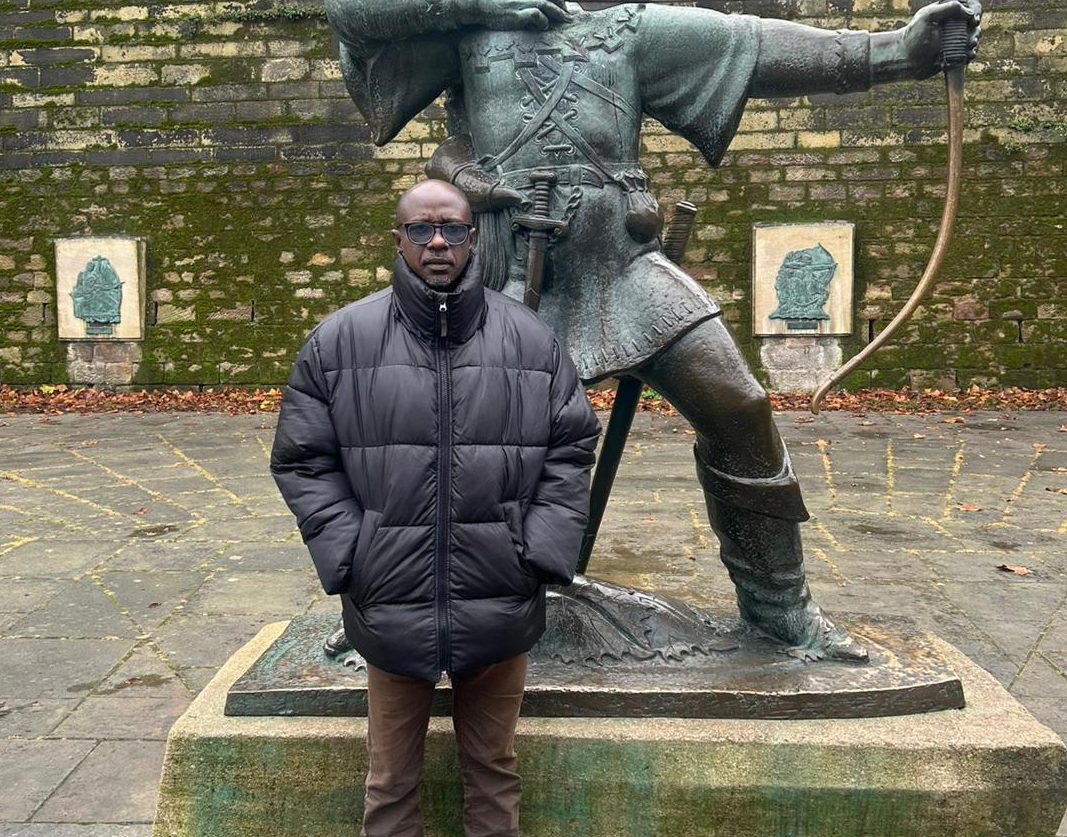Taking picture with armed robber