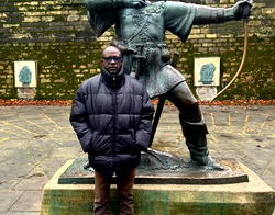 Taking picture with armed robber