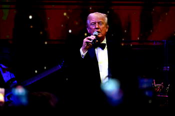 Trump blames bruised hand on aspirin, denies falling asleep