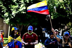 Venezuela military tells population to resume normal activities