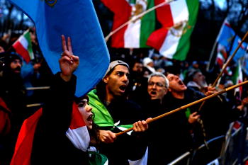 Iran university suspends three students for burning flag