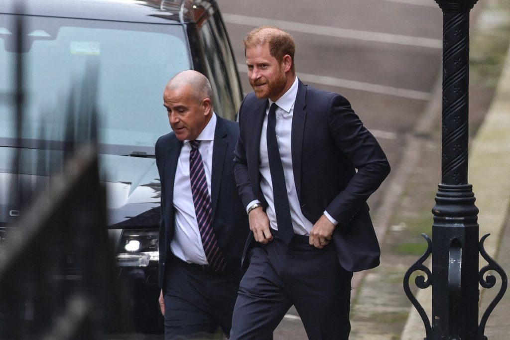 Prince Harry accuses tabloids of making Meghan’s life ‘absolute misery’