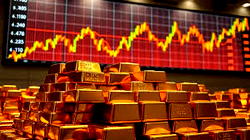Gold nears $5,000, silver shines as stocks slip on turbulent week