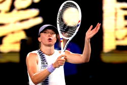Swiatek survives scare to make Australian Open second round