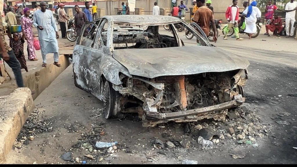 Irate youths set suspected yahoo boy’s vehicle on fire after crushing meat seller in Ekiti