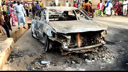 Irate youths set suspected yahoo boy’s vehicle on fire after crushing meat seller in Ekiti