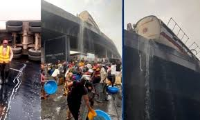 Tragedy averted in Lagos as Police, LASTMA chase away residents scooping diesel from fallen tanker