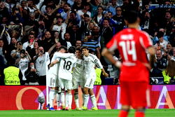 Real Madrid defeat Benfica 2-1 to reach Champions League last 16