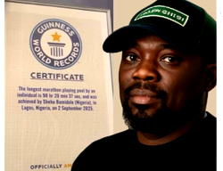Shehu Bamidele officially receives Guinness World Record for longest 8-ball pool marathon
