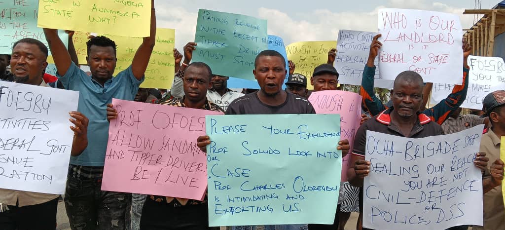 Tension in Onitsha as sand miners, tipper drivers protest alleged extortions by OCHA Brigade