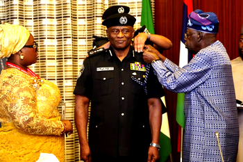Breaking: Tinubu decorates Disu as acting IGP