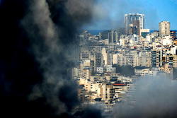 Israel says hit Iran internal security sites, missile launchers