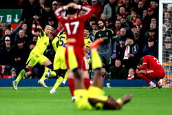 Tottenham strike late to stun Liverpool, end losing streak