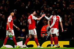 Eze rocket fires Arsenal into Champions League quarters