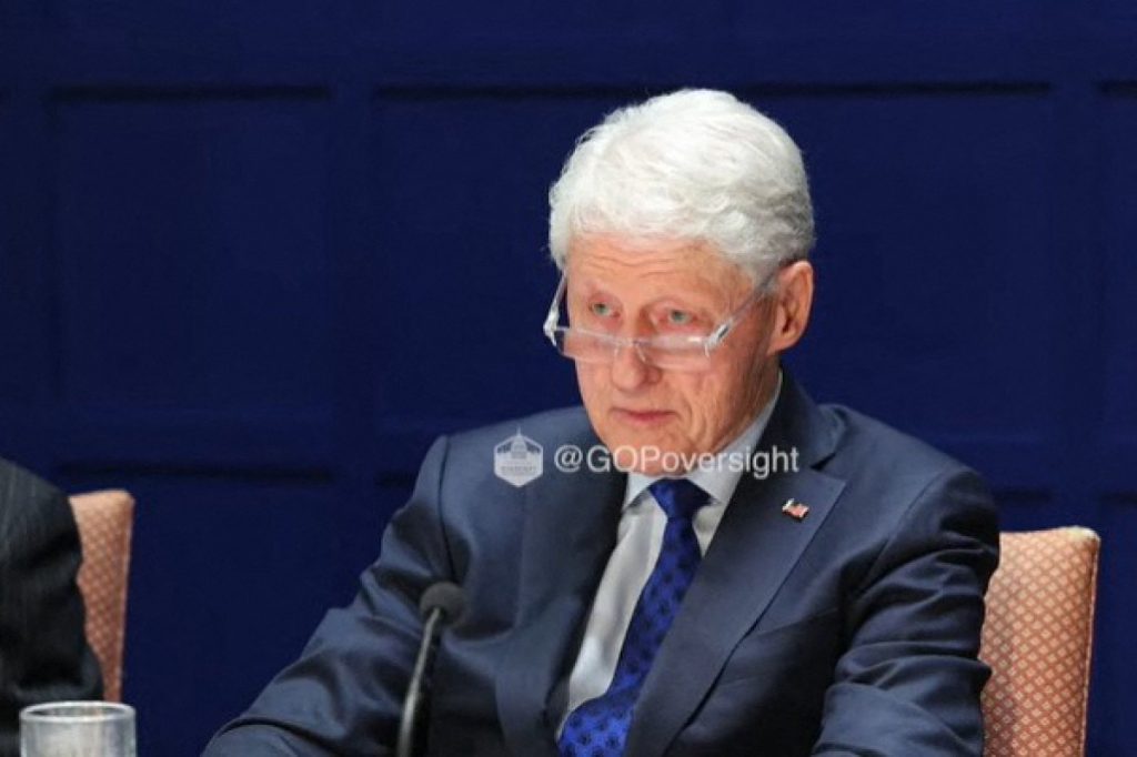 Ex-US president Clinton explains hot tub, pool photos from Epstein files
