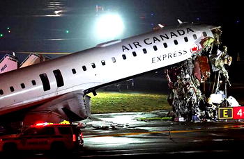 Two pilots killed, dozens injured as Air Canada plane collides with fire truck