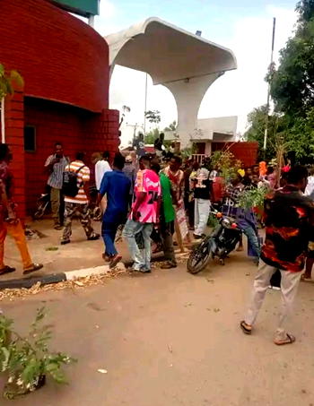 JoSTUM students block campus gate over alleged NELFUND non-payment