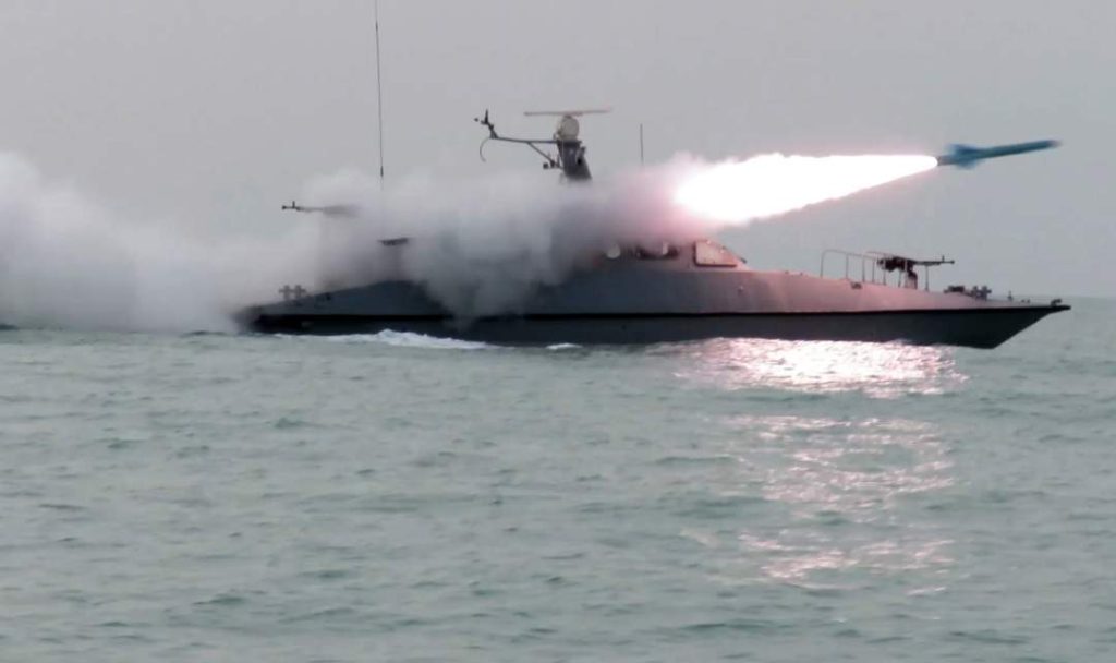Three vessels set ablaze as Iran threatens to close Gulf oil chokepoint