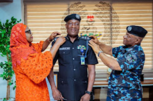 IGP Disu decorates Jimoh Moshood Olohundare as Assistant Inspector-General of Police
