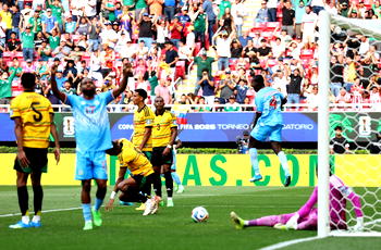 DR Congo fans dance in the rain after sealing World Cup spot