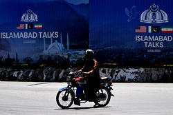 Iran ups threats over naval blockade, but still talking to US